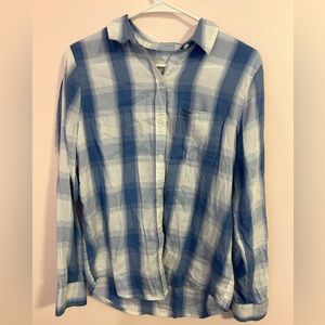 Blue flannel with white buttons